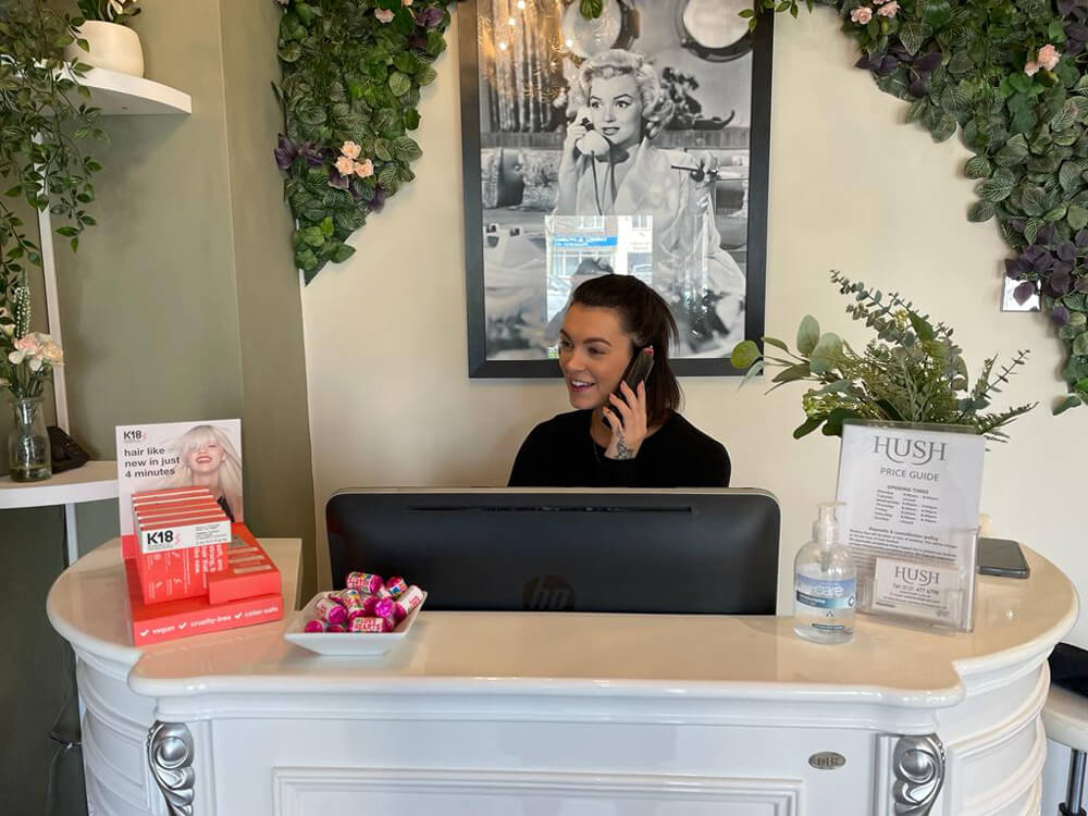 Photo Of Maisy On Phone In Hush Hair Salon